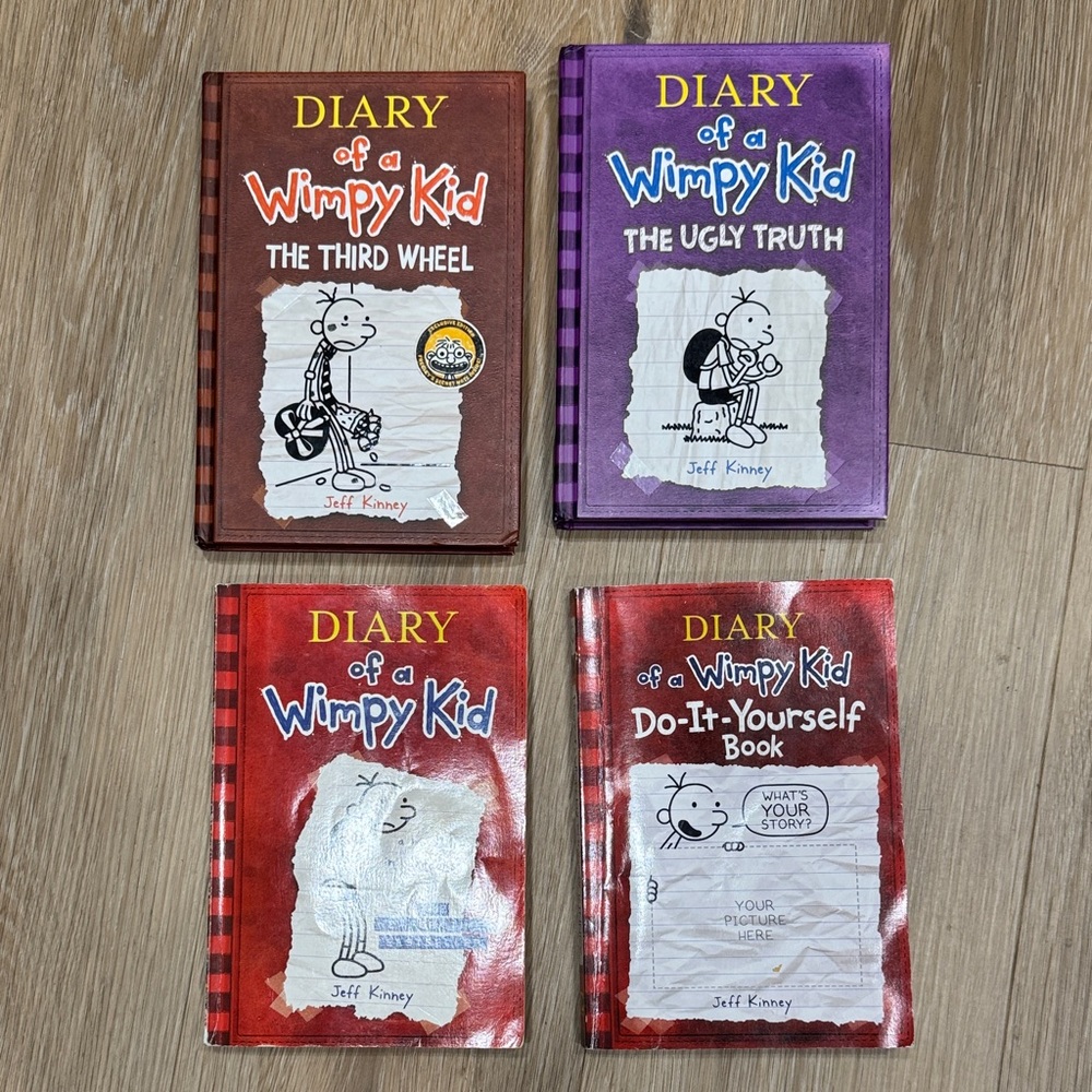 Three Diary of a Wimpy Kid Books (Two Hardcover One Paperback)